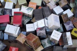 perfume boxes in a pile