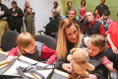 Christine with her sons Taylor and Payton on adoption day. 