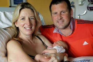 Alison Mountney and Craig Flynn with their 'quake baby', Harriet.

