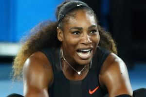 Serena Williams celebrates winning the Australian Open over her sister Venus.