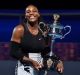 Serena Williams with the cup after beating sister Venus Williams.