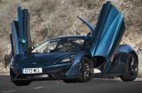 The McLaren 570GT's  lift-up dihedral doors may stop the traffic but quickly lose their novelty when you're using them.