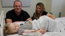 Lucy Hinchion with her parents after her infusion. 