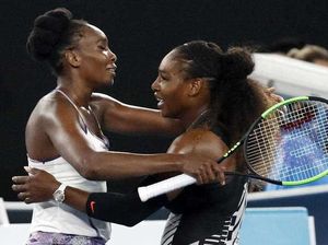 United States' Serena Williams, right, and her sister Venus, left, embrace after Serena won the women's singles final at the Australian Open tennis championships in Melbourne, Australia, Saturday, Jan. 28, 2017. 