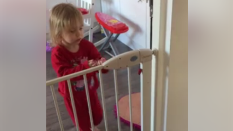 Two-year-old Michaela escaped from her baby gate using a toy necklace. 