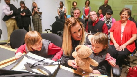 Christine with her sons Taylor and Payton on adoption day. 