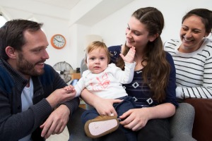 Au pair Annika Abraham with her host family Matthew Eglan, Amanda Buckland and one-year-old Lucy, in their Sydney home. 