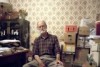 Portrait of a Whistleblower: Avon Hudson in his office surrounded by his archives.