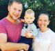 Jenna West with her husband Winston and their son. She has embraced living without the Sydney commute in a town that ...