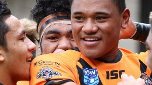 Unconquered Tigers maul Magpies Mar 31, 2015 | By Tigers Moses Suli being congratulated by his team. Balmain?s?all ...