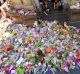 Love of the people: The mass of flowers placed by the public outside Melbourne GPO in tribute to the victims of the ...