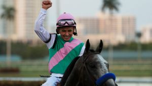 Jockey Mike Smith celebrates atop Arrogate.