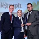 Andrew Coggins and Gavin Elliott of CBRE are presented with their award by Neil Logan, partner of category sponsor Wilson Nesbitt