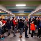 NEW YORK, NY - NOVEMBER 8: People wait in line to vote at a polling site at Public School 261, November 8, 2016 in New York City. Citizens of the United States will choose between Republican presidential candidate Donald Trump and Democratic presidential candidate Hillary Clinton. (Photo by Drew Angerer/Getty Images)