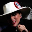 RALEIGH, NC - NOVEMBER 08: Musician Lady Gaga performs during a campaign rally with Democratic presidential nominee former Secretary of State Hillary Clinton at North Carolina State University on November 8, 2016 in Raleigh, North Carolina. The midnight rally followed Clinton campaigning in Pennsylvania, Michigan and North Carolina in the lead up to today's general election. (Photo by Justin Sullivan/Getty Images)