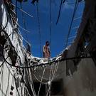 A Yemeni worker looks at the damage at the Noor Centre for the Blind after it was reportedly destroyed by Saudi-led air strikes in the capital Sanaa on January 5, 2016. AFP/Getty Images