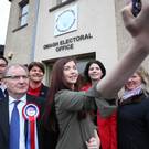 DUP leader Arlene Foster poses for a photograph outside Omagh Electoral Office as she began her election campaign yesterday