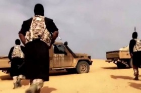 AQIM fighters in a propaganda video, somewhere in the Sahara desert. This footage was taken by Al-Andalus Media ...