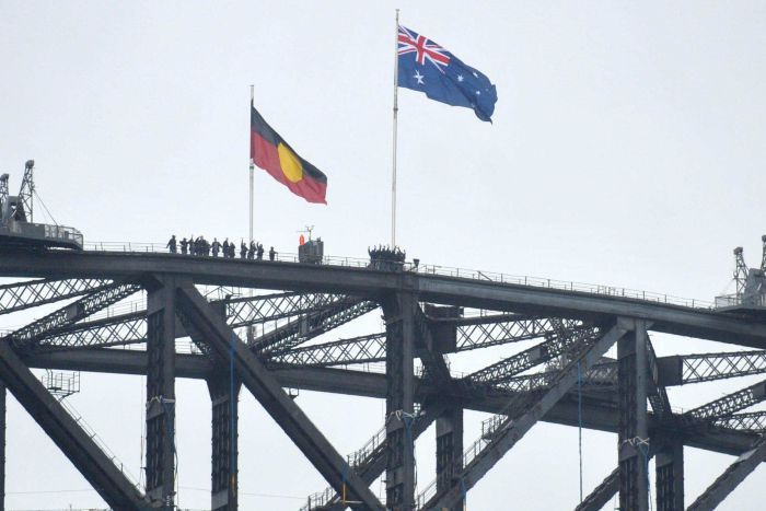 Flags fly over Sydney Harbour