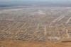 Aerial photo of a large tent city in desert