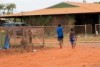 Boys with spears walk the streets of the Bidyadanga Aboriginal community in the West Kimberley.