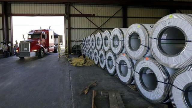 Date: 01/20/2017 Description: A truck pulls into the warehouse of an international engineering systems company in Texas. © AP Image