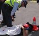 Protesters lie on the driveway outside the Indonesian embassy in Canberra.