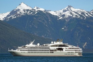 Le Soleal takes passengers past the snow-capped mountains and pine-topped islands of Alaska.