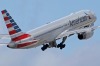 In this Friday, June 3, 2016, photo, an American Airlines passenger jet takes off from Miami International Airport in ...