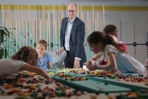 Nathan Jones, and his children, have found the school holiday program at his workplace, Insurance Australia Group, a boon.