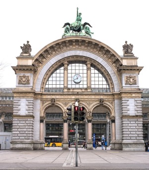 The magnificent old gate of Lucerne's railway station is in front of the new one.