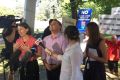 Protesters mar the ministry announcement by Premier Gladys Berejiklian and Deputy Premier John Barilaro  in Queanbeyan.