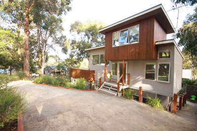 front of house room for 3 cars in Drive