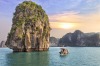 Sunset among the rocks of Halong Bay, Vietnam.