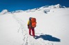 Sherpa trekking up a high altitude glacier towards the summit of Mera Peak (6654m) deep in the remote Makalu Barun ...