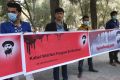 Afghan civil society activists protest the peace deal with warlord Gulbuddin Hekmatyar.