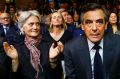 Francois Fillon, right, with his wife Penelope during a rally of his Republican Party in Paris in November.