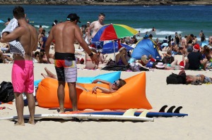 Another country: People celebrate Christmas Day on Bondi Beach.