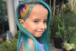 Lyra Thomaston, 6, with her rainbow unicorn-inspired haircut and dye.