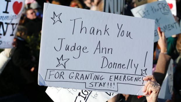 A sign acknowledging Judge Ann Donnelly, who granted a stay on Donald Trump's order blocking immigrants trying to reach ...