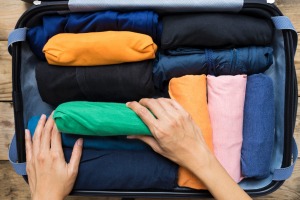 No need to drag a heavy suitcase around: Pack clothes made from light-weight materials such as silk.