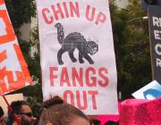 Chin Up, Fangs Out sign Oakland women's march