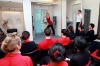 Aircrew for Emirates shown how to operate an aircraft emergency door, during a training session at the Emirates Aviation ...