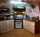 COOBER PEDY, AUSTRALIA - OCTOBER 22: The kitchen area is seen inside Faye's Underground Home on October 22, 2015 in ...