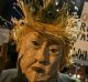 A demonstrator wearing a mask in the likeness of US President Donald Trump protests against his executive order in Los ...