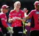 SYDNEY, AUSTRALIA - JANUARY 14: Kim Garth of the Sixers celebrates with team mates after taking the wicket of Alex ...
