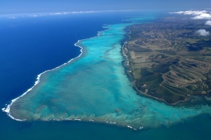 View from the top: Turquoise lagoon with saltwater channels and white sandy beach.