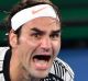 Roger Federer celebrates after beating Rafael Nadal.