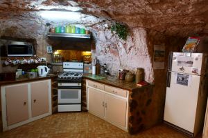 COOBER PEDY, AUSTRALIA - OCTOBER 22: The kitchen area is seen inside Faye's Underground Home on October 22, 2015 in ...