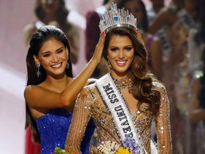 Iris Mittenaere of France is crowned the new Miss Universe 2016 by 2015 Miss Universe Pia Wurtzbach in coronation Monday, Jan. 30, 2017